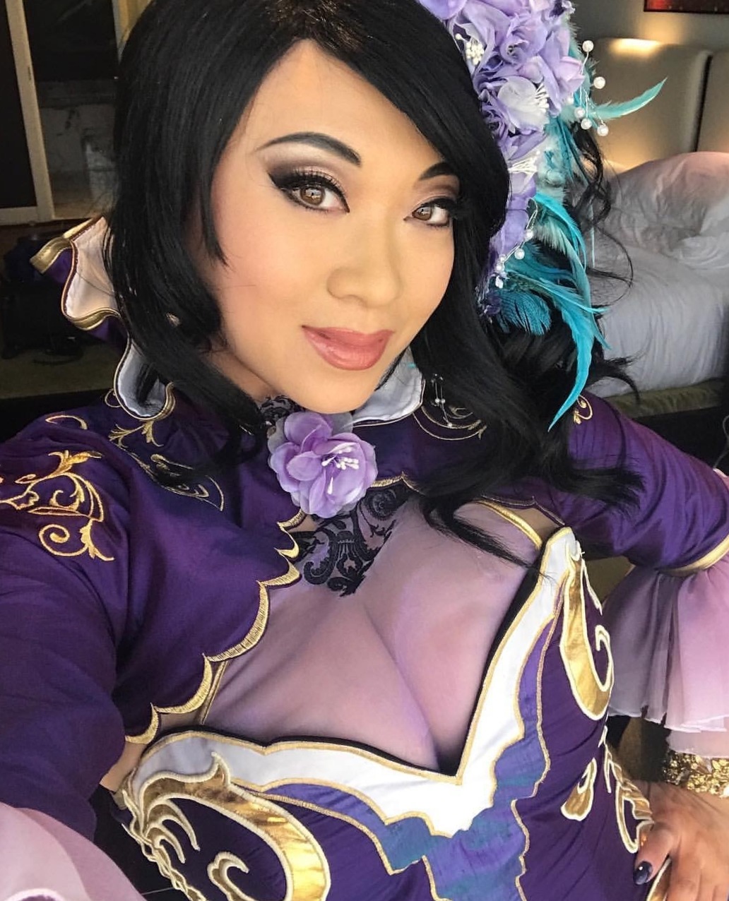 Pretty chick Yaya Han seduces you with awesome tits.
