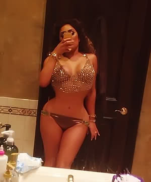 Stunning Nikki Mudarris strips her great titties