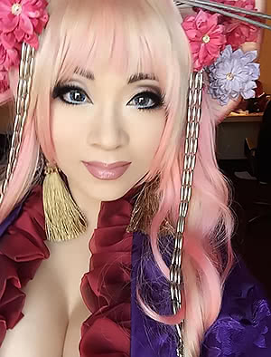 Spicy Yaya Han poses and demonstrates her wonderful breasts