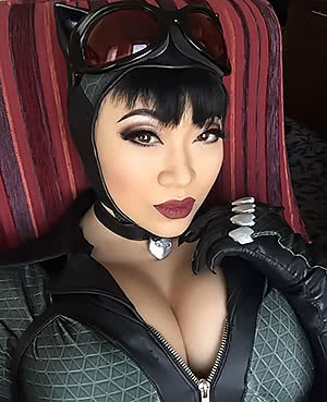 Spicy Yaya Han poses and demonstrates her massive breasts