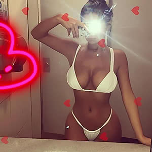 Spicy cutie Demi Rose teases with unbelievable titties